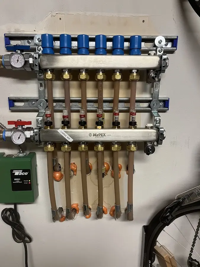 Plumber performing Water Heater Repair at a residential property in Strafford